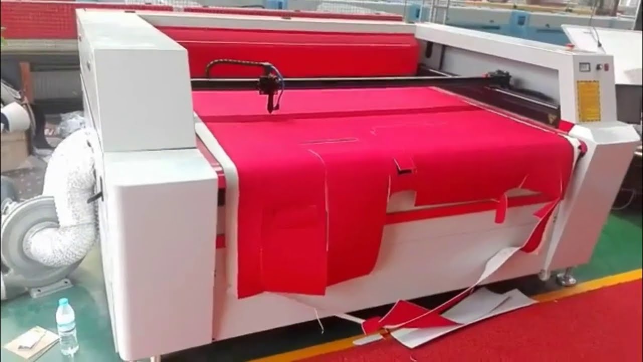 帶自動(dòng)送料器的家用數(shù)控激光布料切割機(jī) 帶自動(dòng)送料器的家用數(shù)控激光布料切割機(jī)